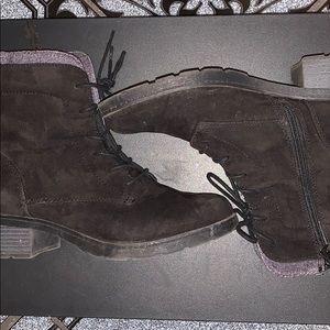 Black combat boots. Zipp up adjustable laces